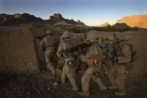 US Marines search a house during Operation Germinate in Farah ...